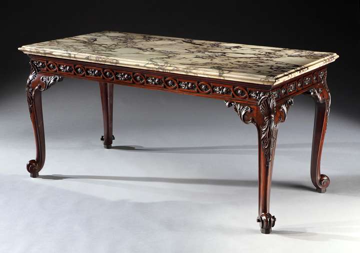 An exceptional George II period carved mahogany serving table with Breccia Rosato marble top